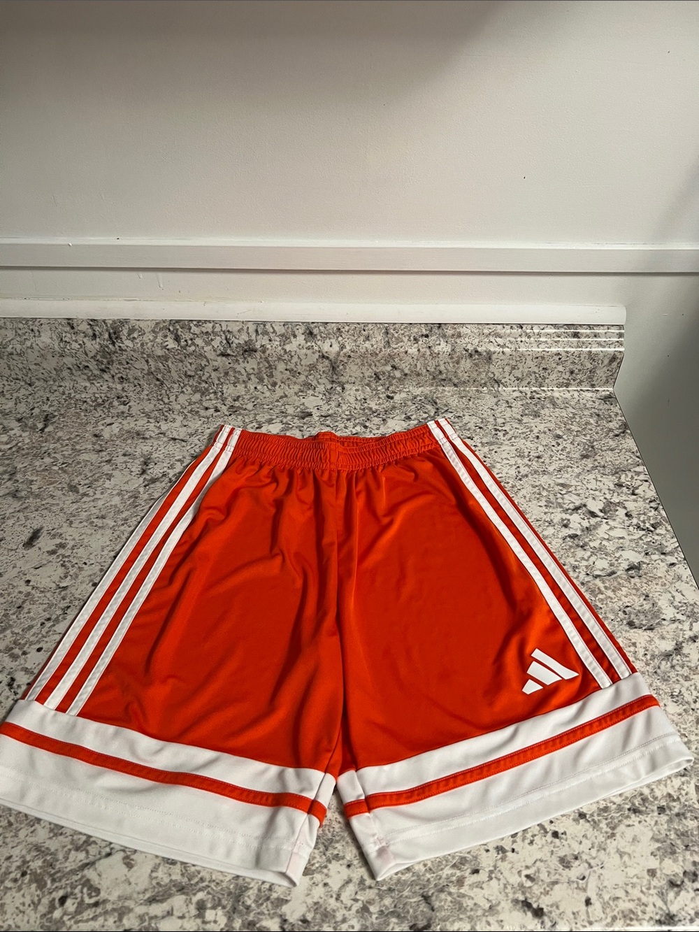 adidas Orange Kids Athletic Shorts with White Stripes